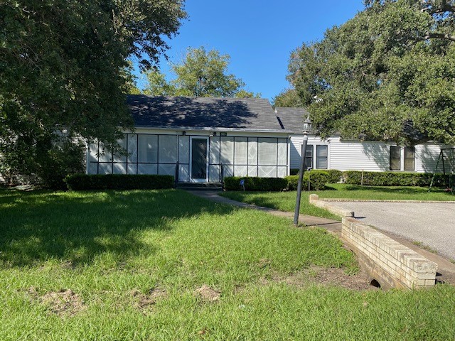 503 Main Street Garwood, TX 77442 - Photo 3 of 24 a house view with a garden space