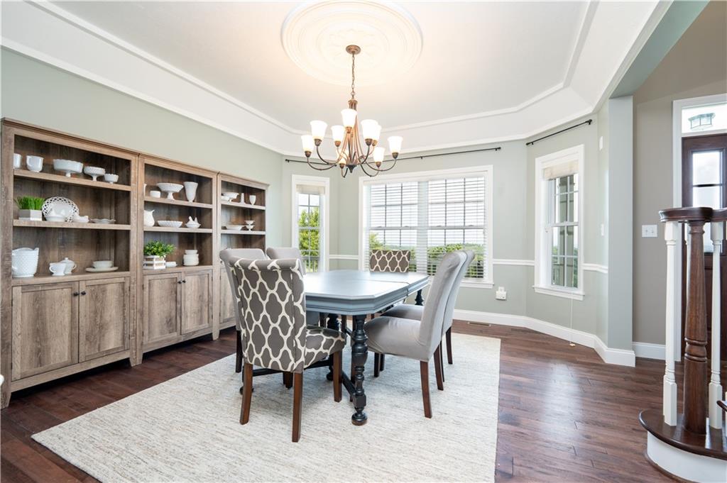 121 Stoney Springs Road Greensburg, PA 15601 - Photo 14 of 45 a view of a dining room with furniture and wooden floor