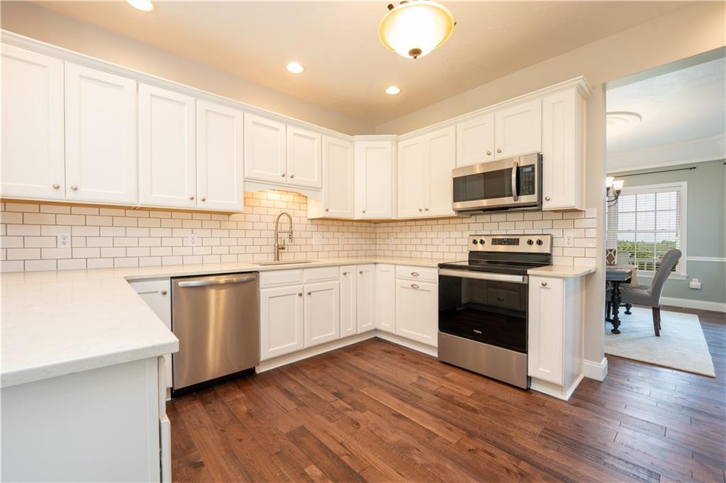 121 Stoney Springs Road Greensburg, PA 15601 - Photo 16 of 45 a kitchen with sink a microwave and cabinets