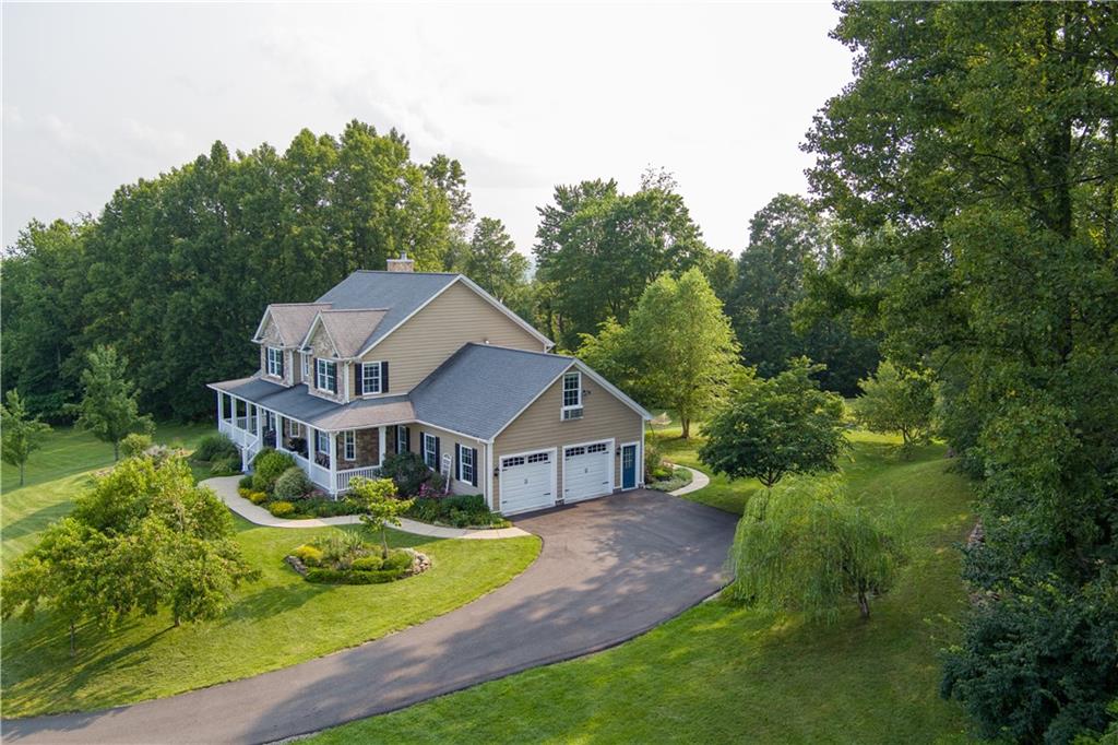 121 Stoney Springs Road Greensburg, PA 15601 - Photo 2 of 45 a aerial view of a house with swimming pool next to a big yard