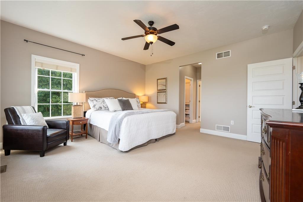 121 Stoney Springs Road Greensburg, PA 15601 - Photo 23 of 45 a bedroom with a bed couch and window