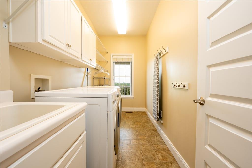 121 Stoney Springs Road Greensburg, PA 15601 - Photo 38 of 45 a utility room with dryer and washer