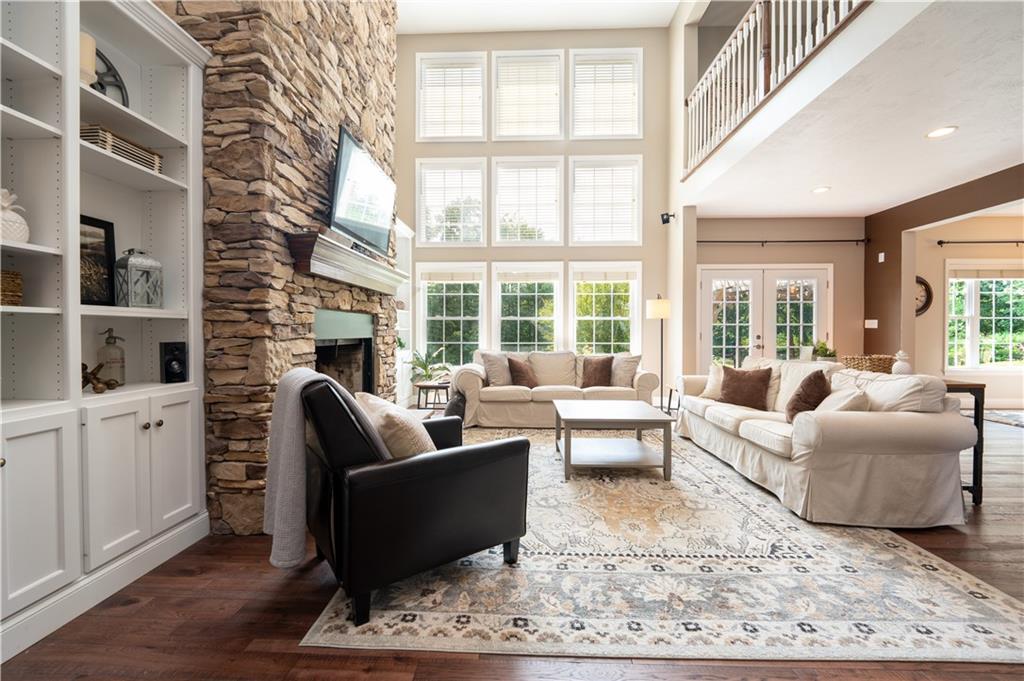121 Stoney Springs Road Greensburg, PA 15601 - Photo 8 of 45 a living room with furniture and a large window