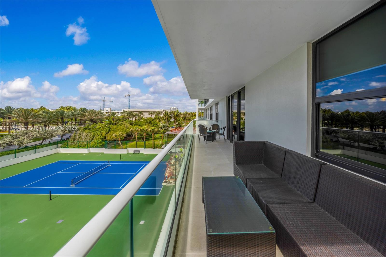 9801 Collins Avenue, Unit 5S Bal Harbour, FL 33154 - Photo 31 of 32 a view of swimming pool with seating area
