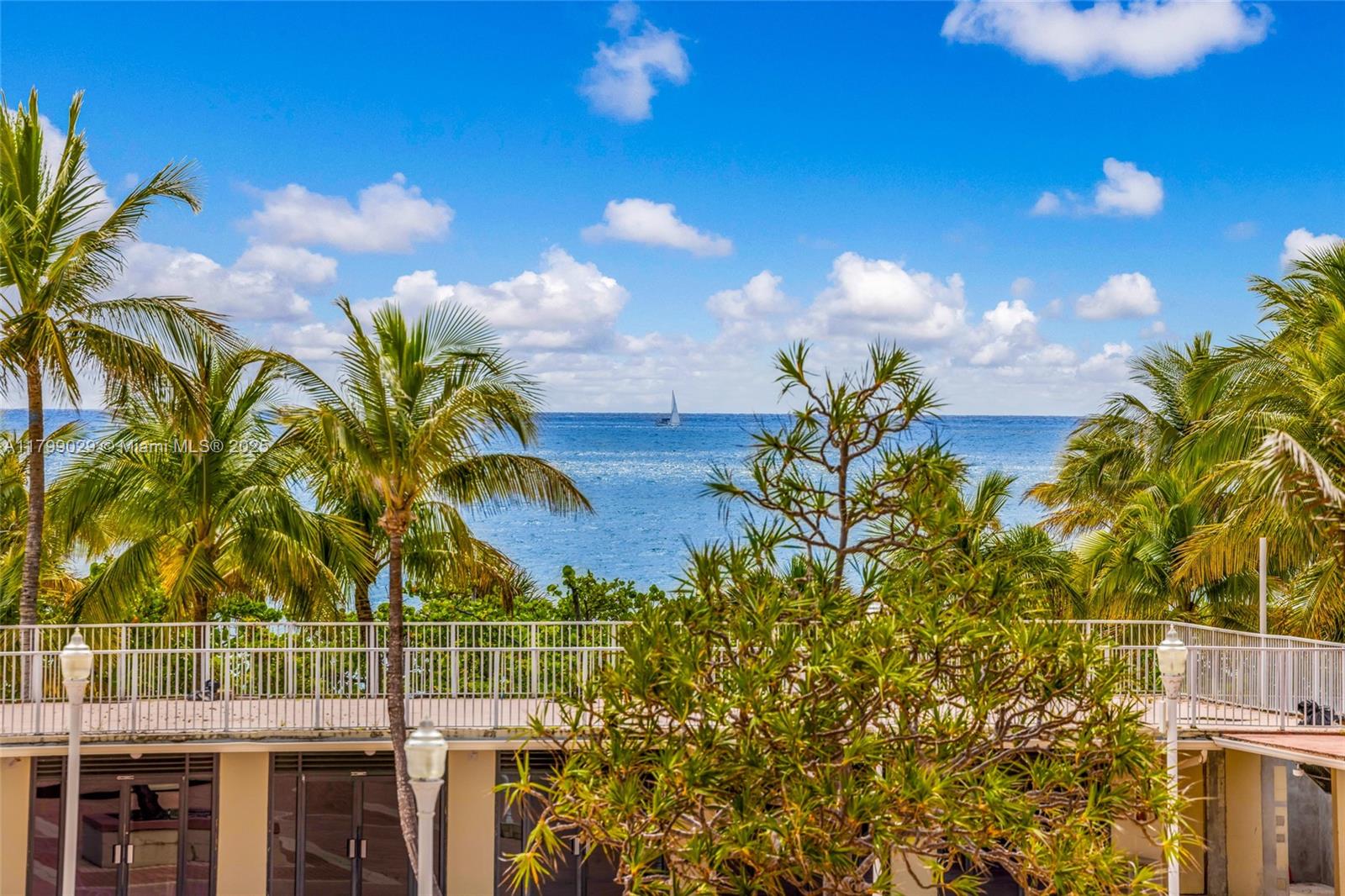 9801 Collins Avenue, Unit 5S Bal Harbour, FL 33154 - Photo 32 of 32 a view of a swimming pool with a yard