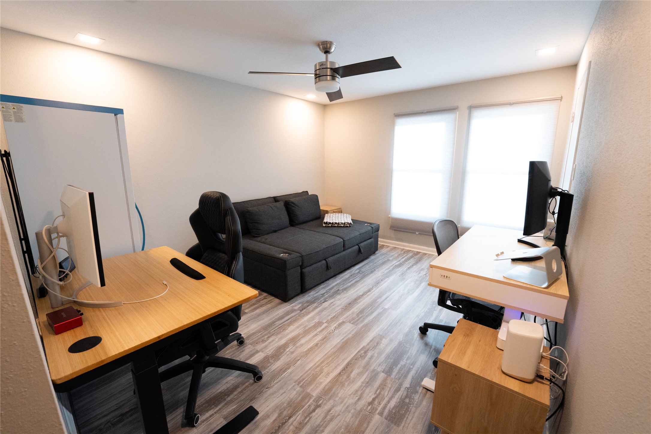 7447 Brompton Street, Unit 7447 Houston, TX 77025 - Photo 21 of 27 Secondary bedroom with large windows with plenty of sunlight.