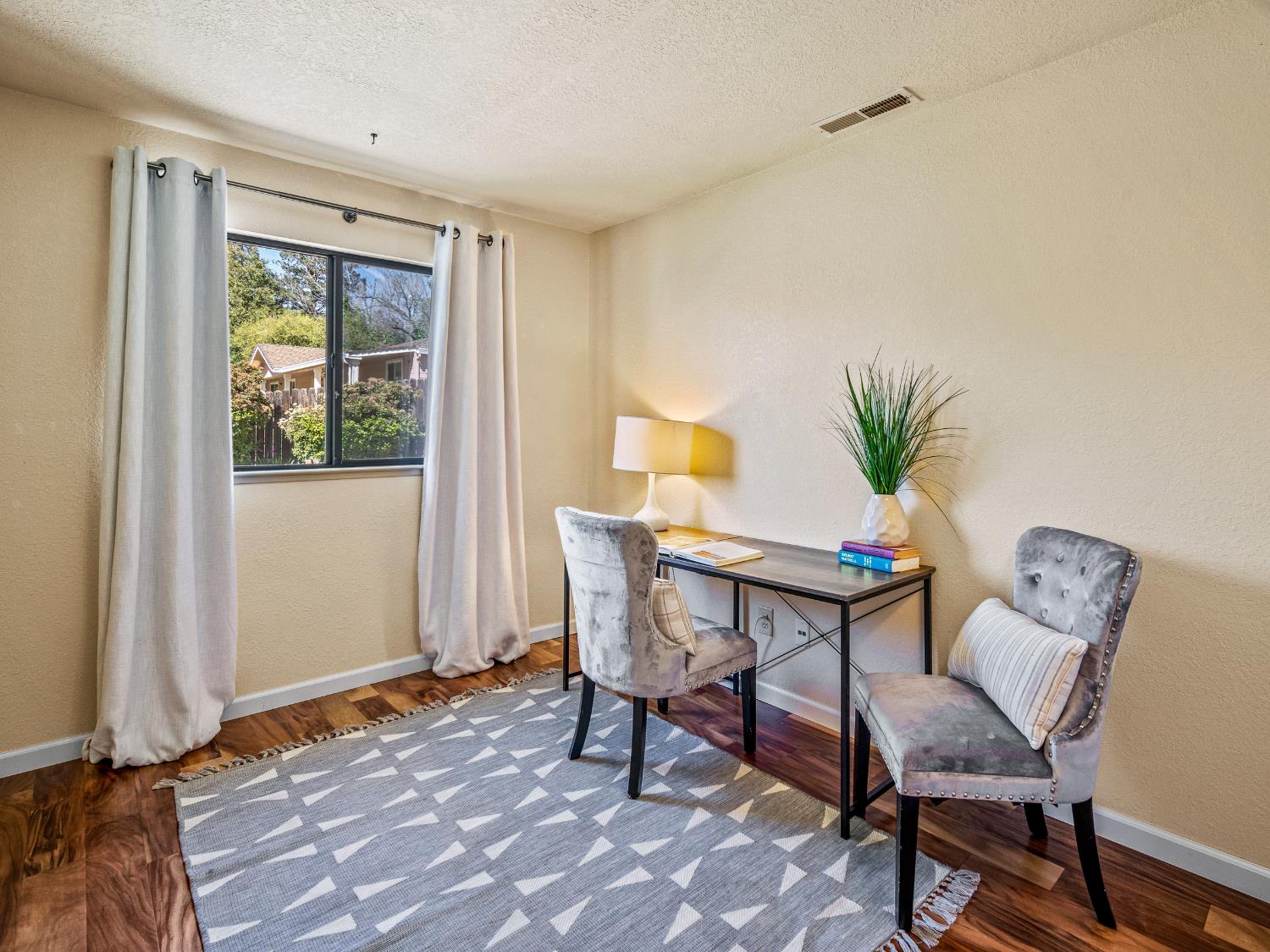 2401 Roxana Street Placerville, CA 95667 - Photo 25 of 45 a workspace room with furniture and wooden floor