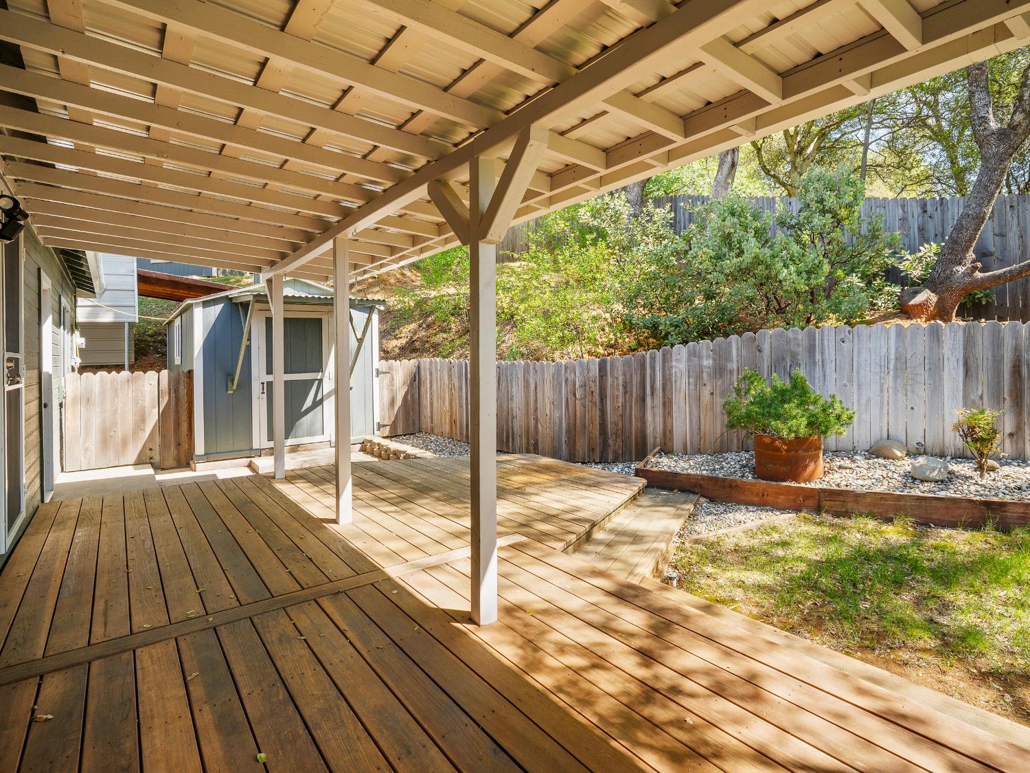 2401 Roxana Street Placerville, CA 95667 - Photo 30 of 45 a view of a backyard with wooden floor