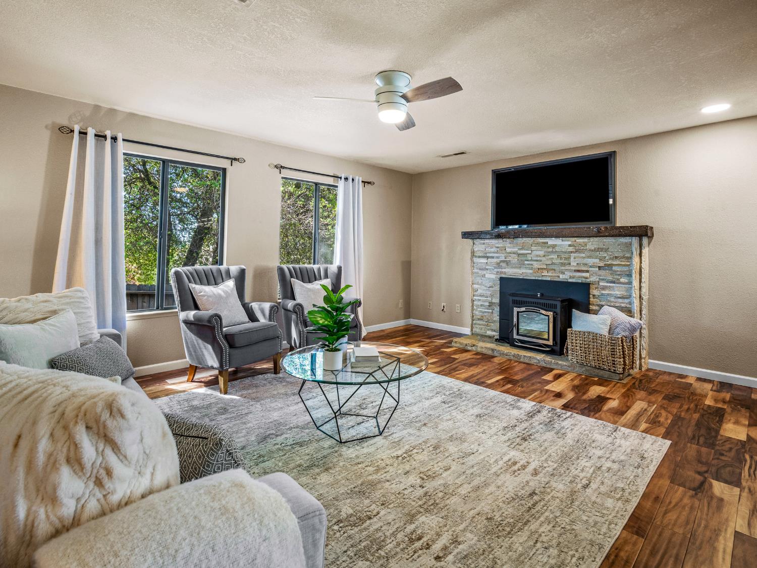 2401 Roxana Street Placerville, CA 95667 - Photo 7 of 45 a living room with furniture and a fireplace