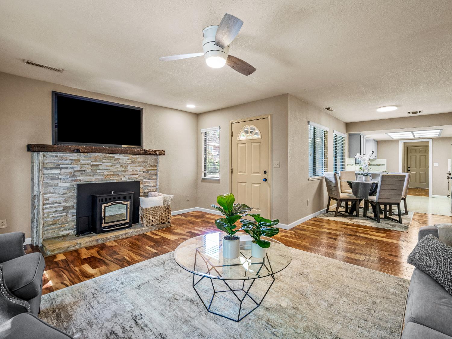 2401 Roxana Street Placerville, CA 95667 - Photo 8 of 45 a living room with furniture and a fireplace