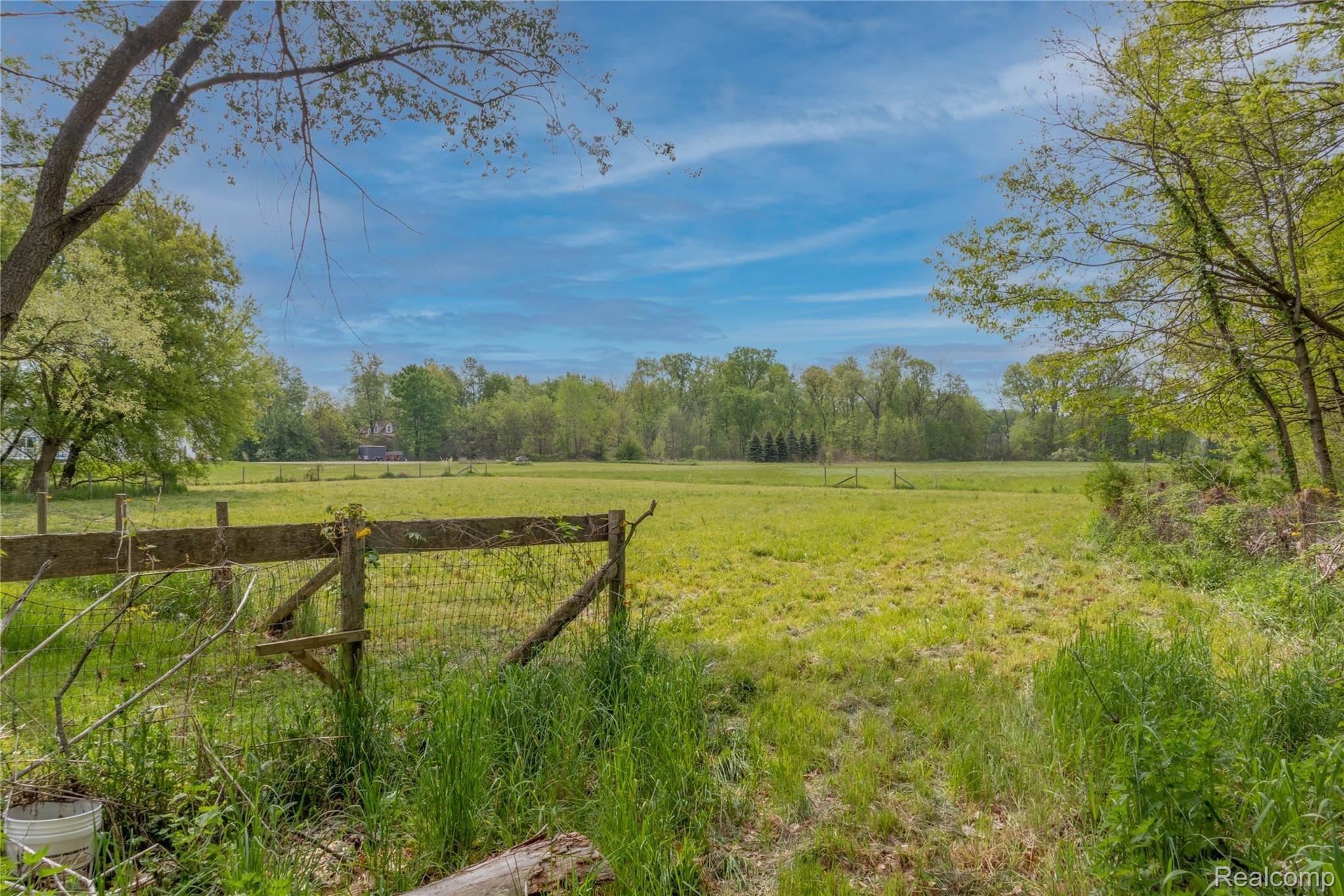 60475 9 Mile Road South Lyon, MI 48178 - Photo 36 of 44 backyard.jpg