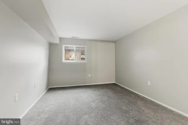 a view of large yard with tree