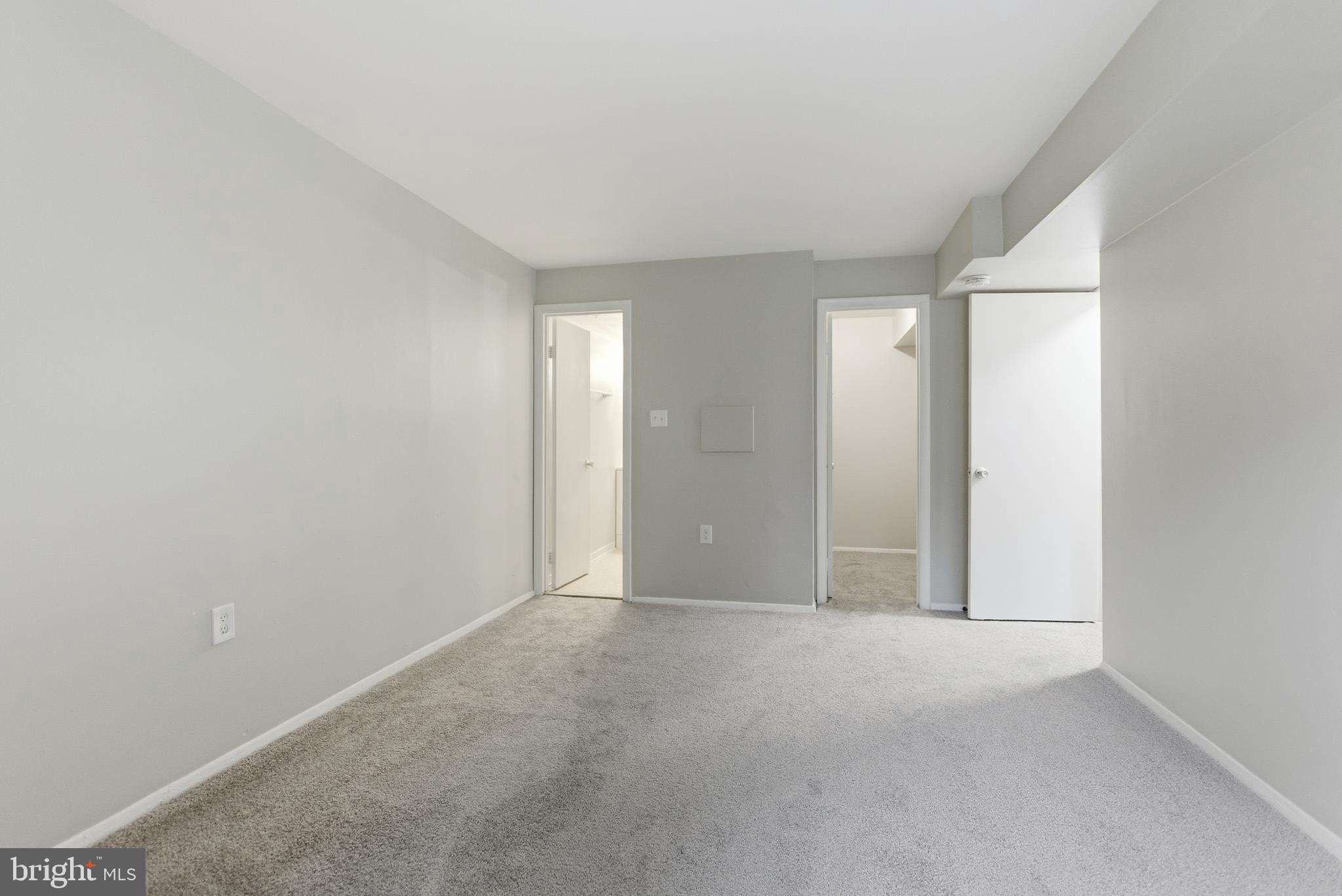 18806 Walkers Choice Road, Unit 2 Montgomery Village, MD 20886 - Photo 3 of 18 a view of an empty room and closet area