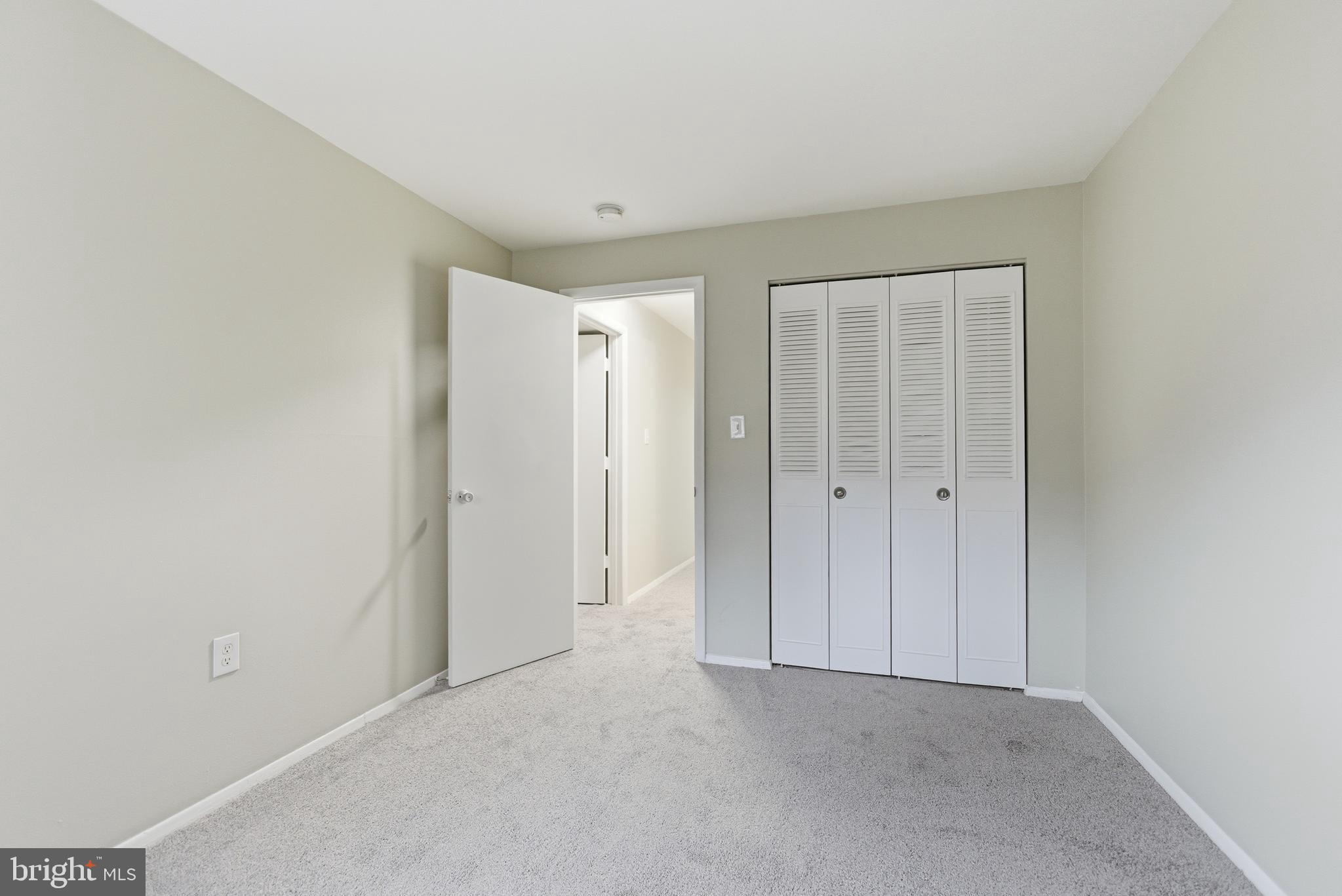 18806 Walkers Choice Road, Unit 2 Montgomery Village, MD 20886 - Photo 4 of 18 a view of an empty room