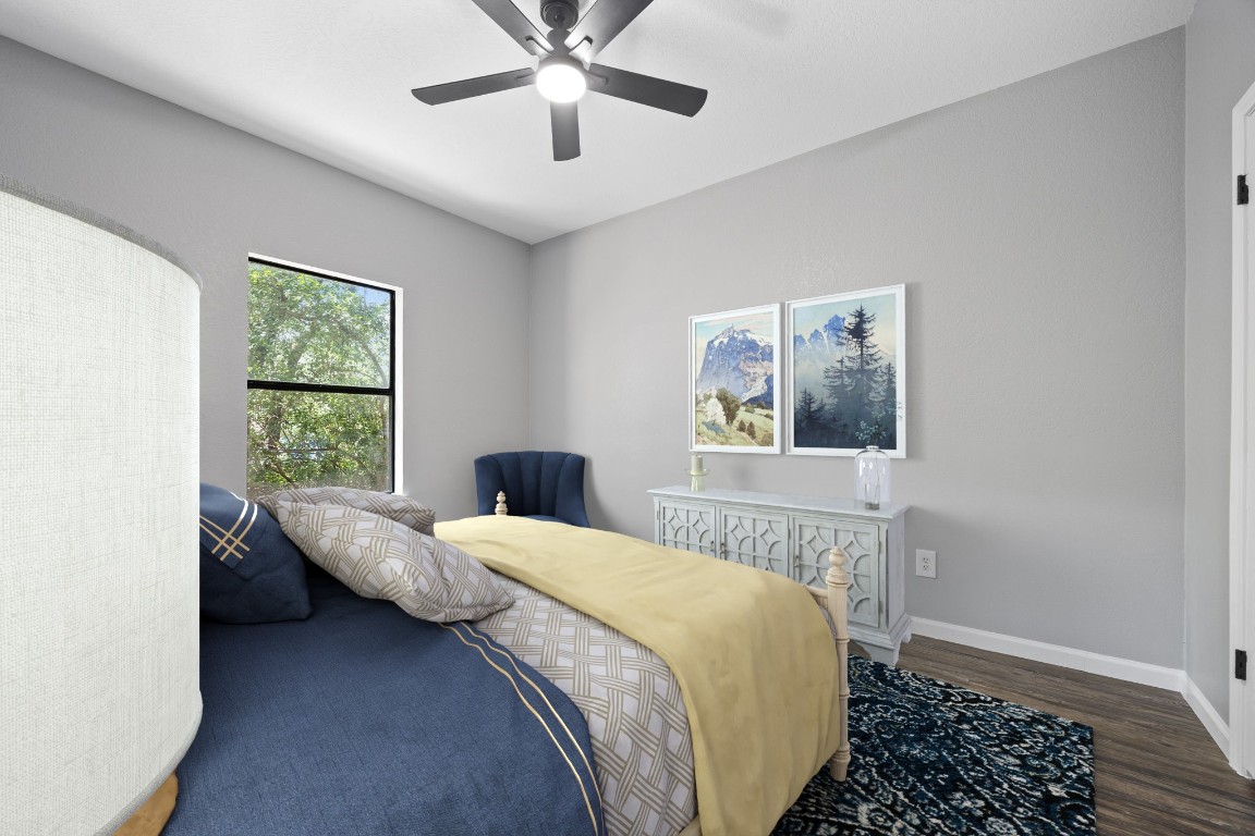 4711 Spicewood Springs Road, Unit 106 Austin, TX 78759 - Photo 13 of 23 a bedroom with a bed and a window