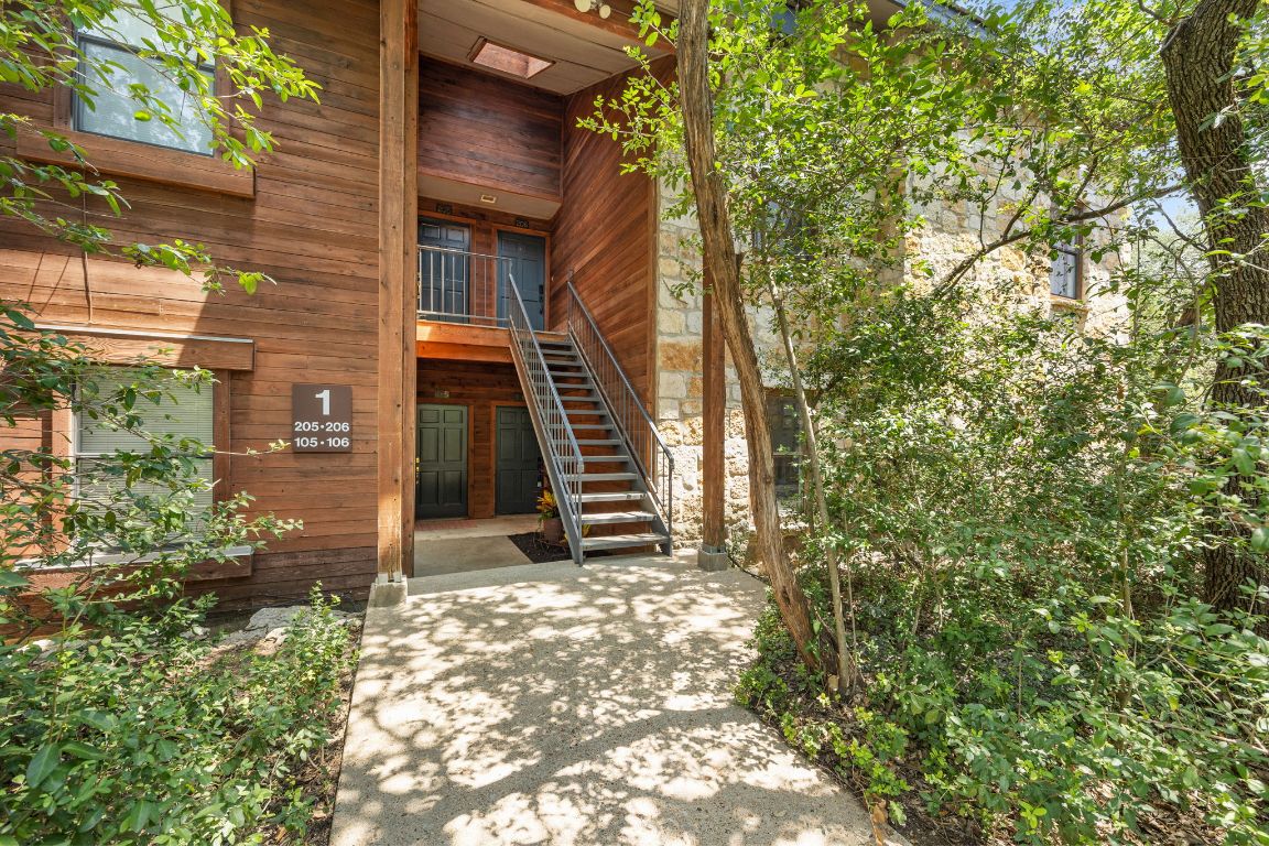 4711 Spicewood Springs Road, Unit 106 Austin, TX 78759 - Photo 19 of 23 a view of a house with a tree
