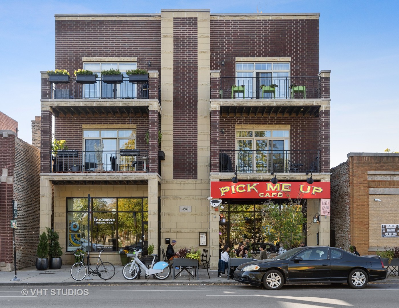4880 North Clark Street, Unit 2B Chicago, IL 60640 - Photo 1 of 15 a car parked in front of a building