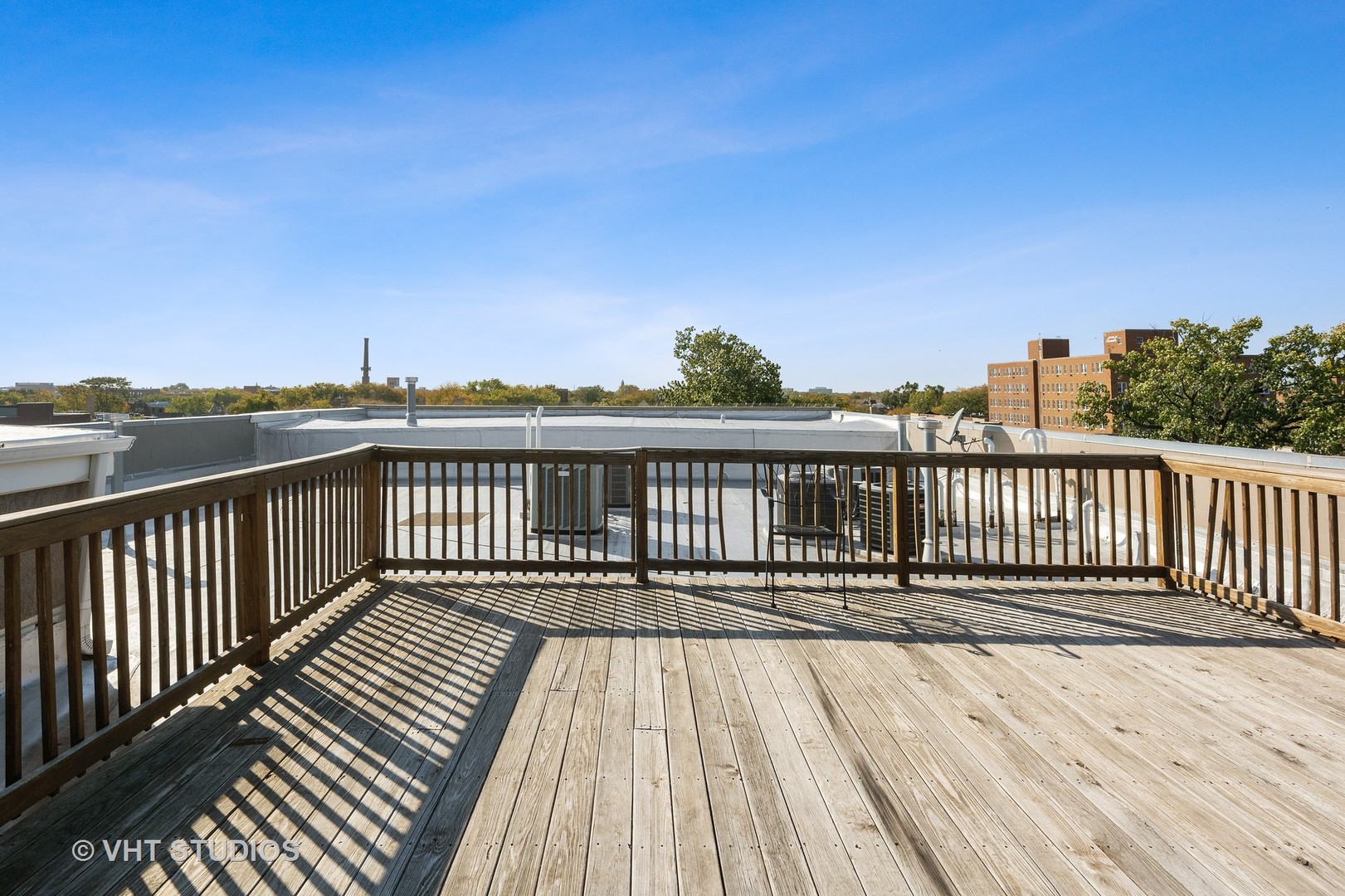4880 North Clark Street, Unit 2B Chicago, IL 60640 - Photo 15 of 15 a view of balcony with wooden floor
