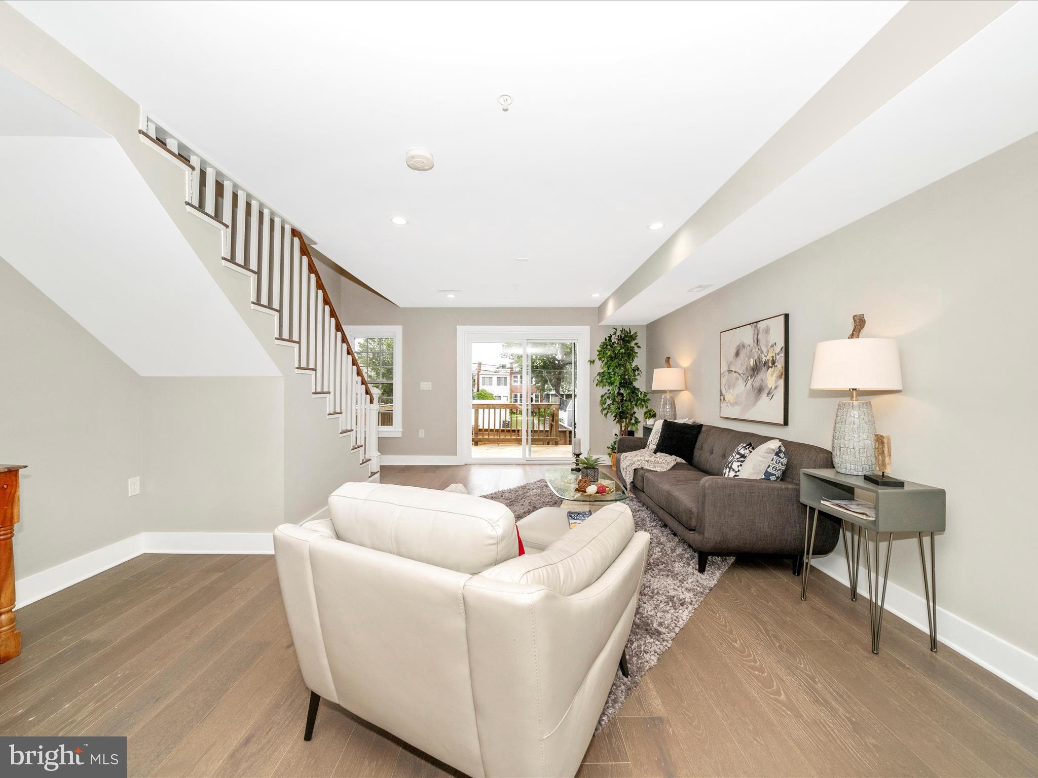 1826 Independence Avenue Southeast, Unit 4 Washington, DC 20003 - Photo 21 of 53 a living room with furniture and a wooden floor