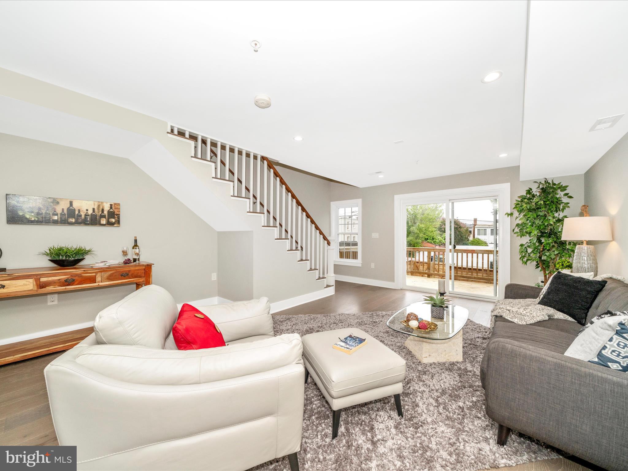 1826 Independence Avenue Southeast, Unit 4 Washington, DC 20003 - Photo 22 of 53 a living room with furniture and a potted plant