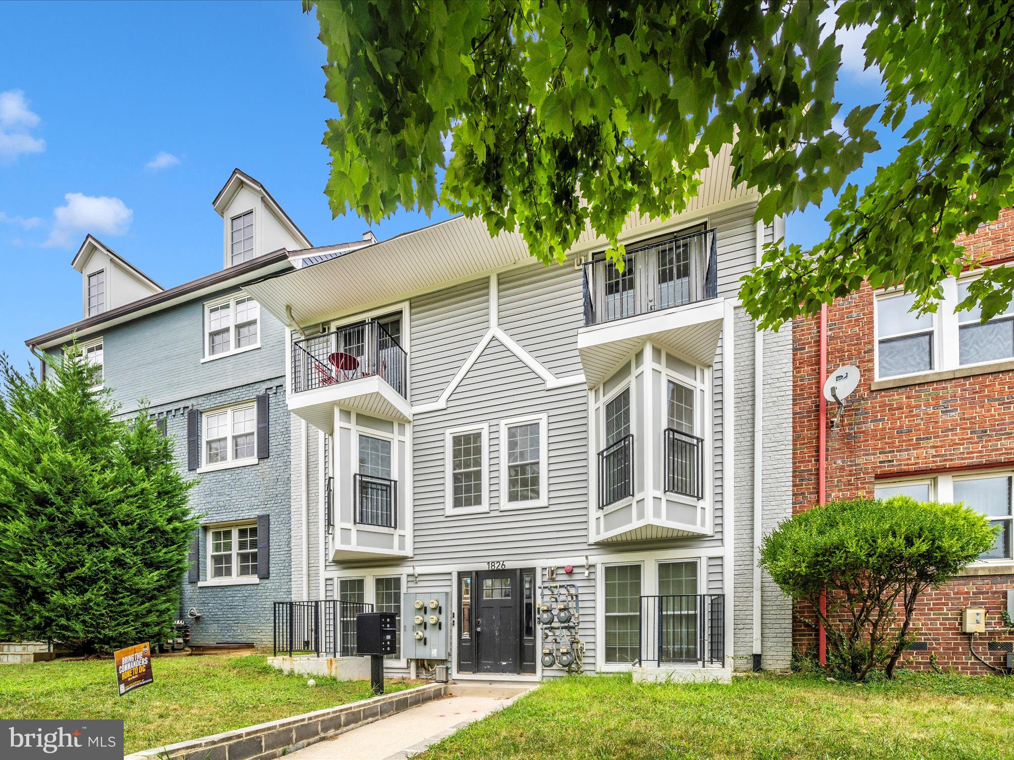 1826 Independence Avenue Southeast, Unit 4 Washington, DC 20003 - Photo 3 of 53 a front view of a house with garden
