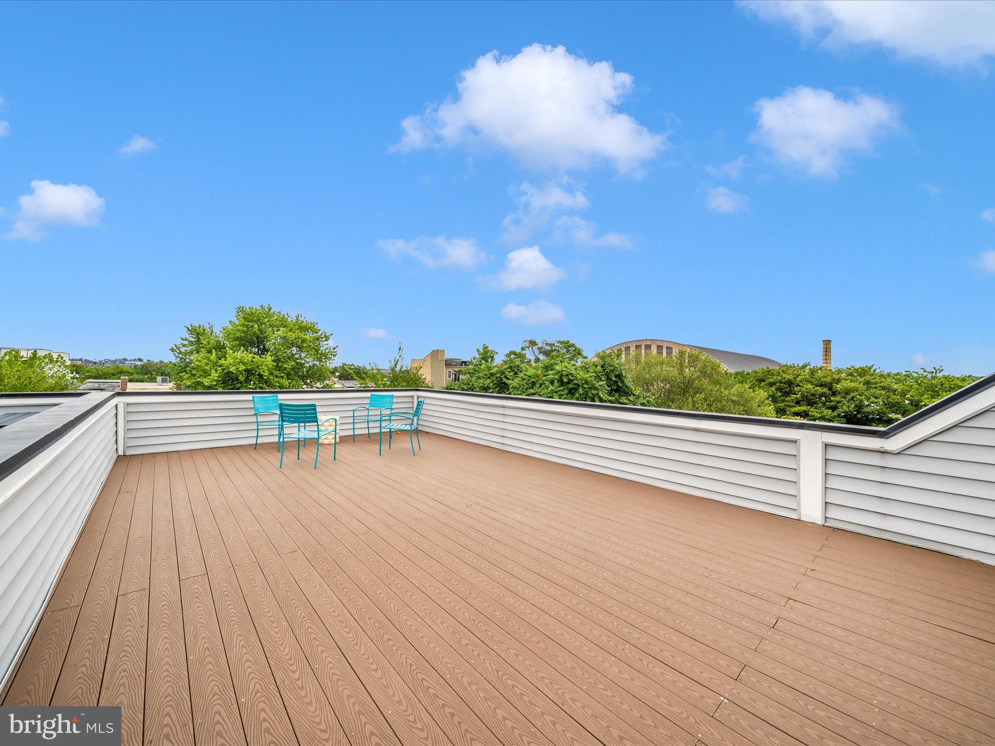 1826 Independence Avenue Southeast, Unit 4 Washington, DC 20003 - Photo 33 of 53 a view of balcony with wooden floor and fence