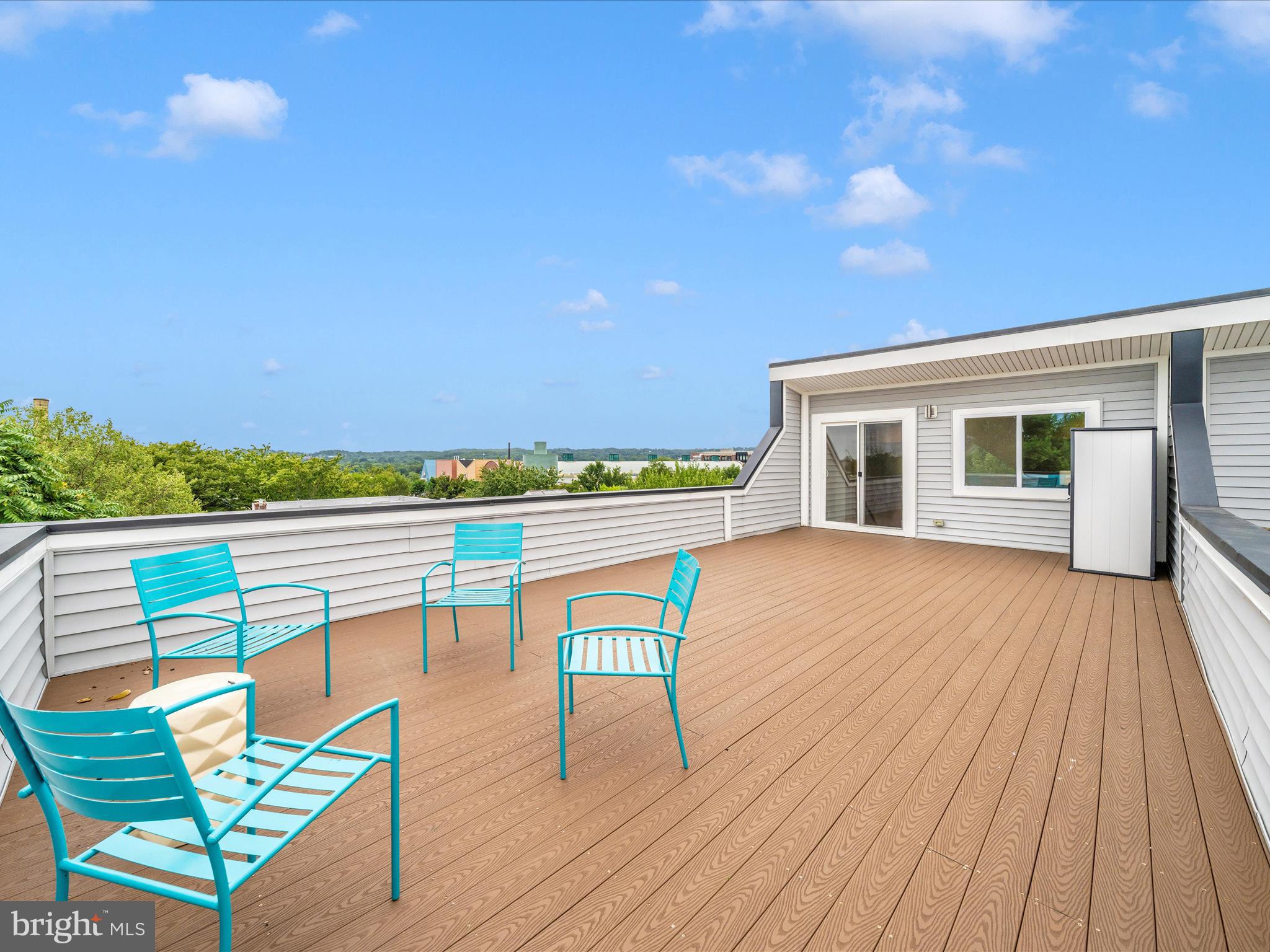 1826 Independence Avenue Southeast, Unit 4 Washington, DC 20003 - Photo 34 of 53 a view of a chairs and table on the wooden floor