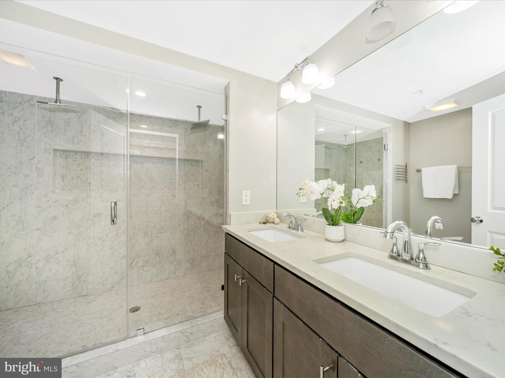 1826 Independence Avenue Southeast, Unit 4 Washington, DC 20003 - Photo 41 of 53 a bathroom with a granite countertop sink mirror and double
