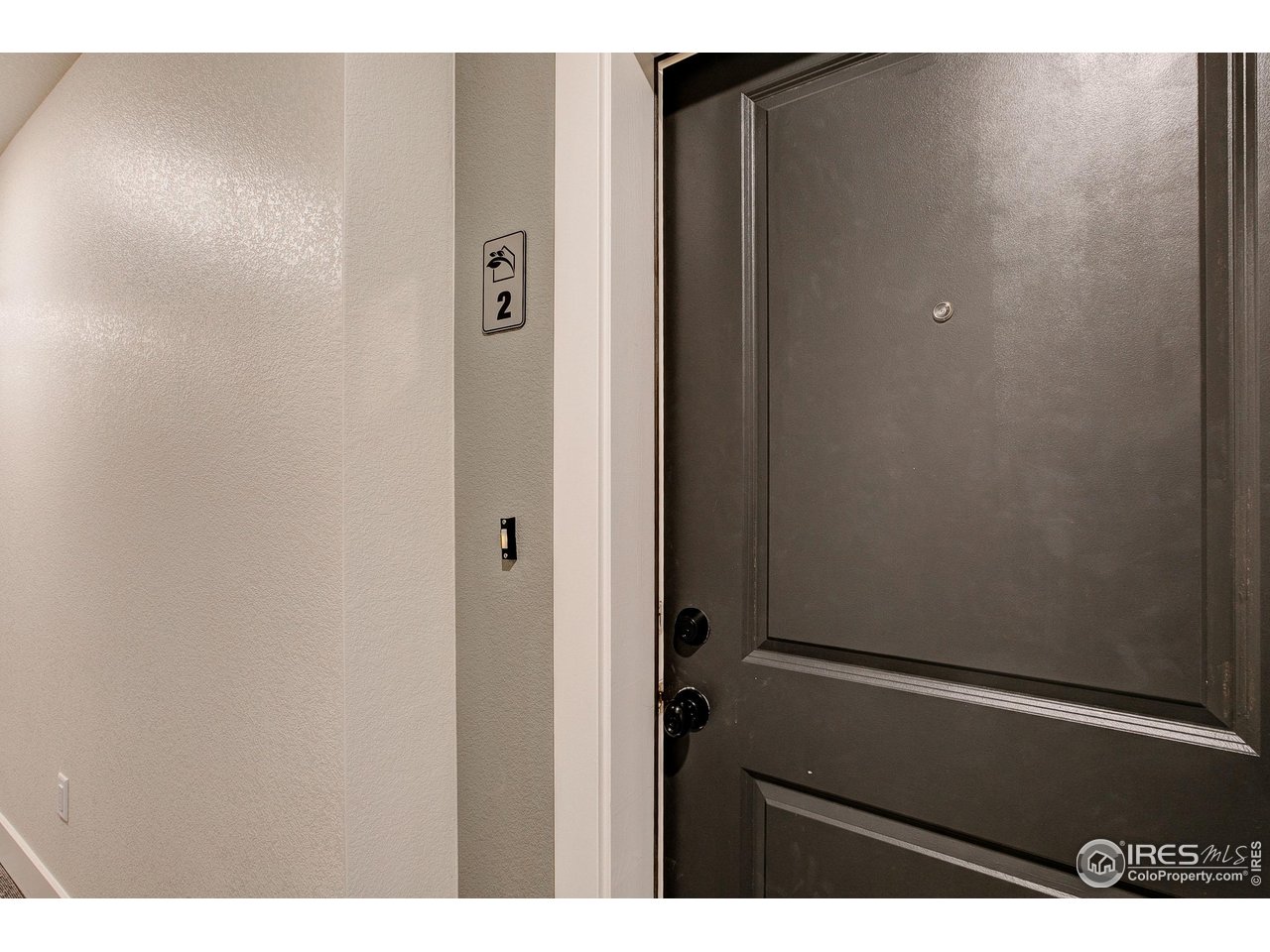 235 High Point Drive, Unit 204 Longmont, CO 80504 - Photo 16 of 22 Secure entry hallway