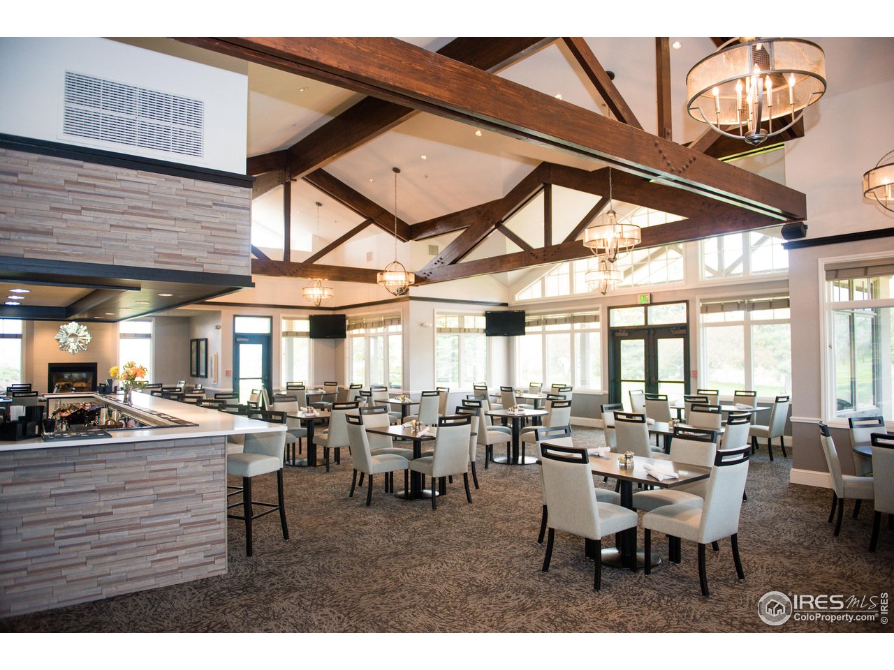 235 High Point Drive, Unit 204 Longmont, CO 80504 - Photo 20 of 22 Fox Hill clubhouse and restaurant