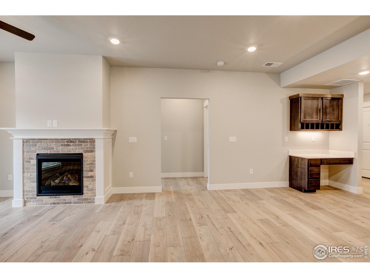 235 High Point Drive, Unit 204 Longmont, CO 80504 - Photo 7 of 22 Cozy up with your included fireplace!