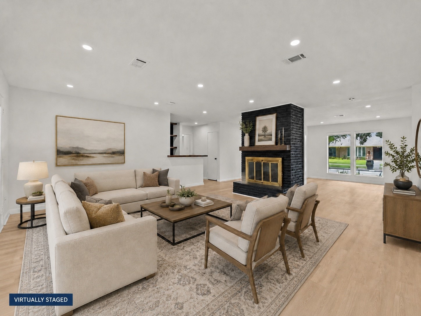 5762 Birdwood Road Houston, TX 77096 - Photo 8 of 50 NOTICE THE NATURAL LIGHT AND OPENNESS OF THE GRAND LIVING ROOM WITH PLENTY OF SPACE FOR LARGE FURNITURE.