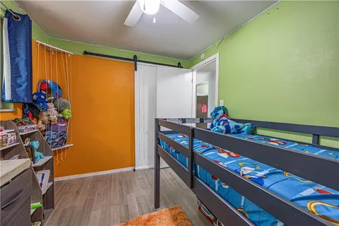 a room with furniture and a window