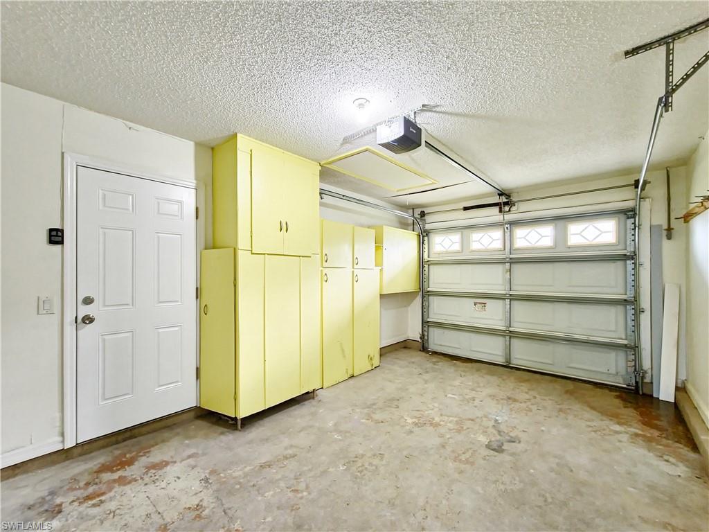 7425 Galloway Road Weeki Wachee, FL 34613 - Photo 15 of 23 a view of empty room with wooden walls