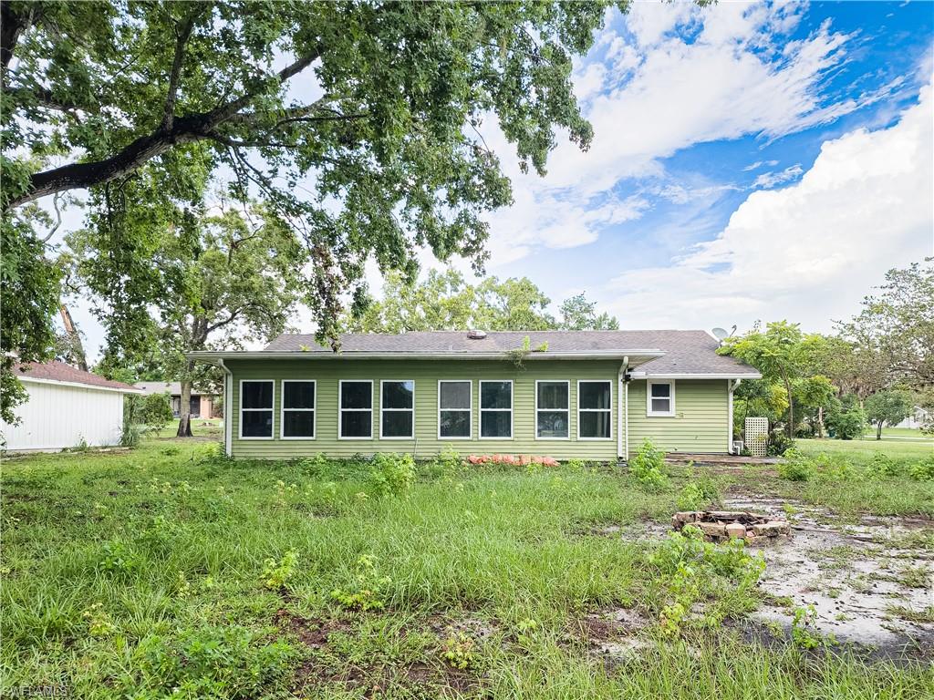7425 Galloway Road Weeki Wachee, FL 34613 - Photo 19 of 23 a house view with a garden space