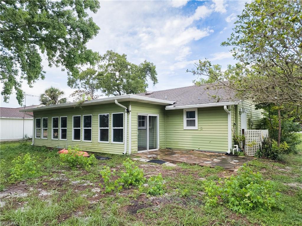7425 Galloway Road Weeki Wachee, FL 34613 - Photo 20 of 23 front view of a house with a yard