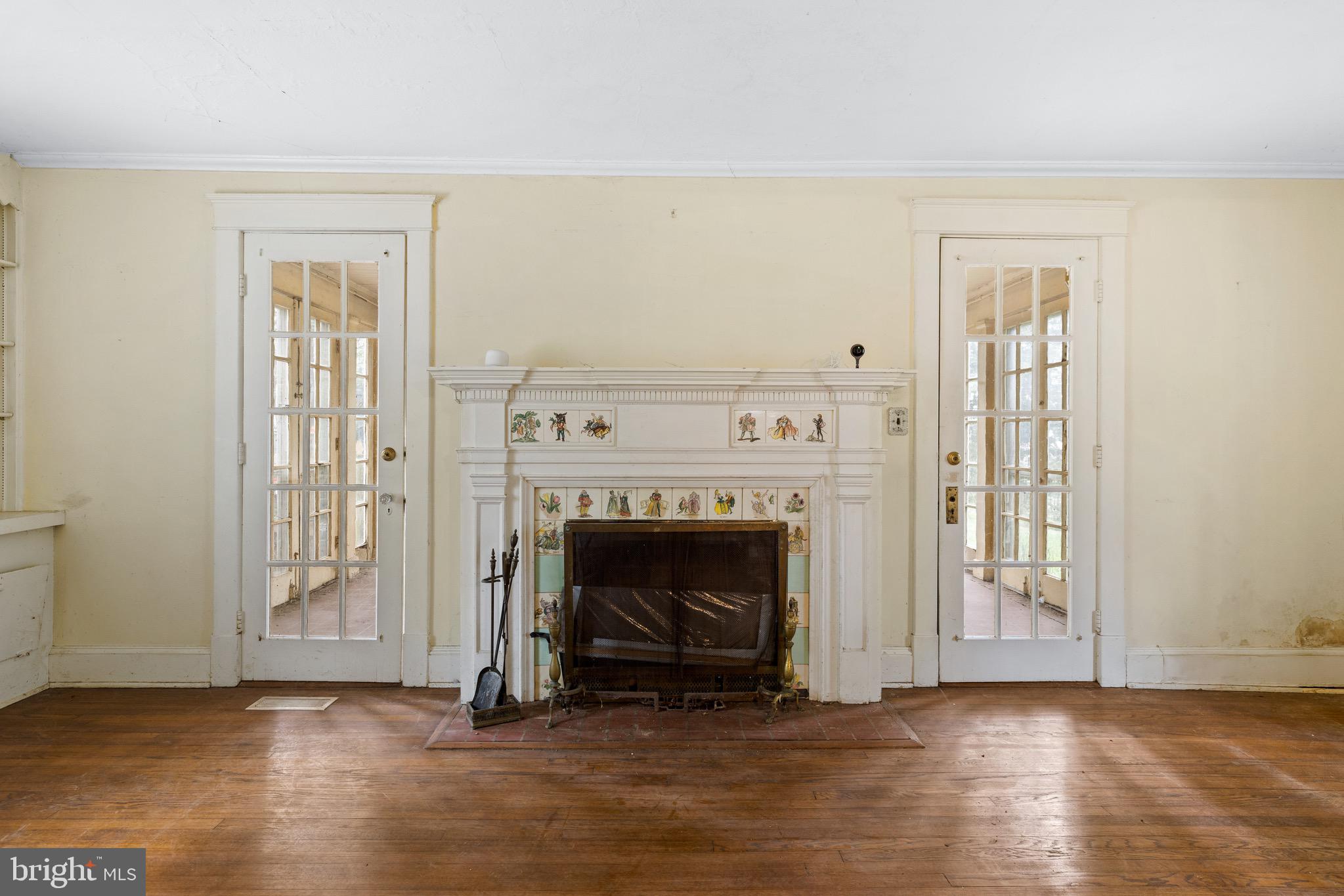 5207 Putney Way Baltimore, MD 21212 - Photo 6 of 65 Fireplace Detail towards Sunroom