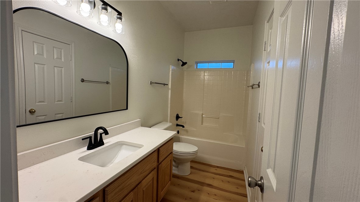 1502 Bluefield Court College Station, TX 77845 - Photo 16 of 26 a bathroom with a sink a toilet and shower
