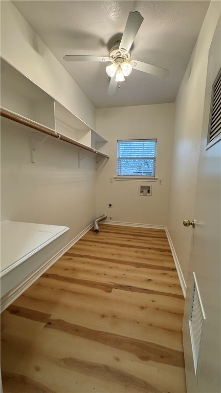 1502 Bluefield Court College Station, TX 77845 - Photo 17 of 26 a room with a bed and a painting on the wall