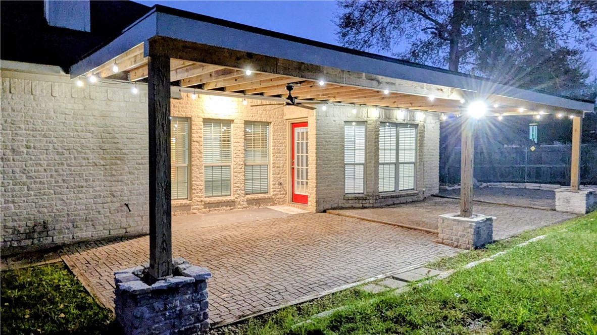 1502 Bluefield Court College Station, TX 77845 - Photo 18 of 26 a view of a porch with a table and chairs