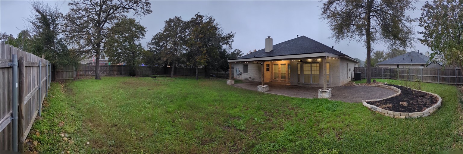 1502 Bluefield Court College Station, TX 77845 - Photo 20 of 26 a front view of a house with a garden