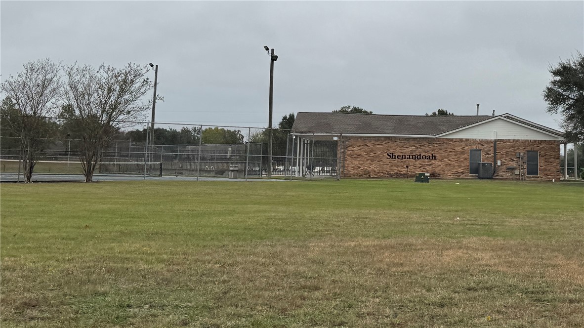 1502 Bluefield Court College Station, TX 77845 - Photo 22 of 26 a view of a house with a yard