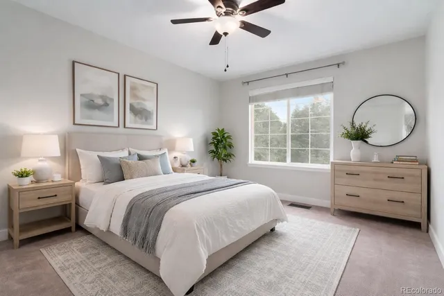 a bedroom with a bed and a dresser