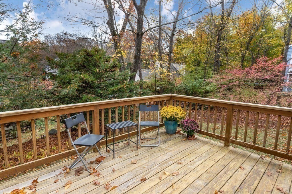 14 Tarbell Avenue Lexington, MA 02421 - Photo 13 of 30 a view of balcony with wooden floor and fence