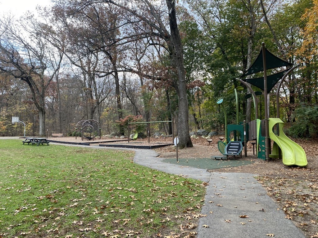 14 Tarbell Avenue Lexington, MA 02421 - Photo 30 of 30 a view of a park with swings and slides