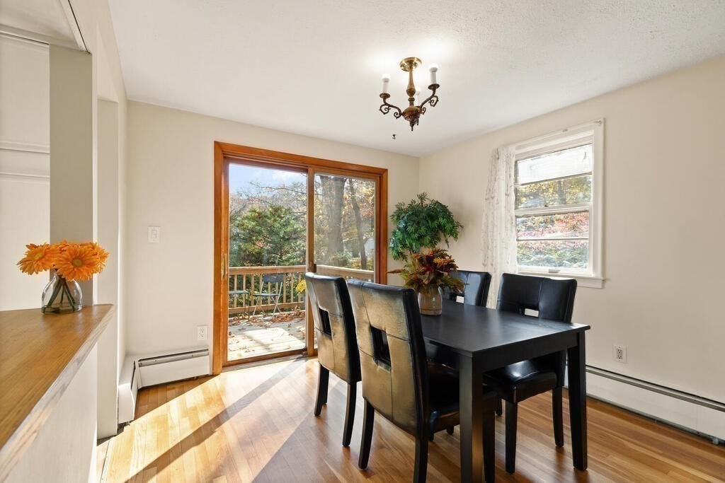 14 Tarbell Avenue Lexington, MA 02421 - Photo 7 of 30 a view of a dining room with furniture window and wooden floor
