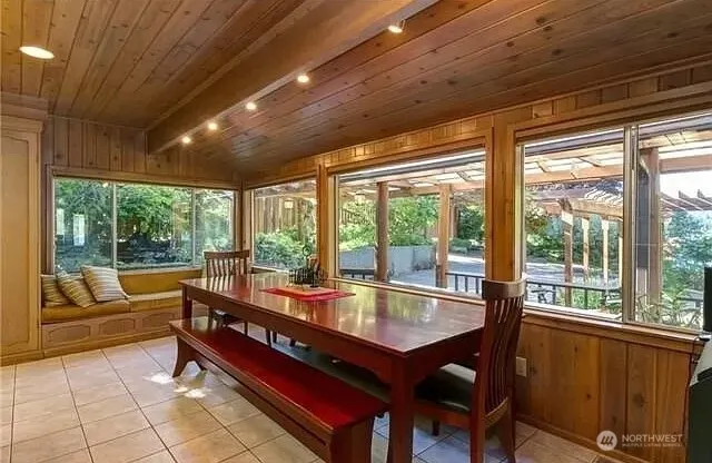 a outdoor dining space with furniture and outdoor view