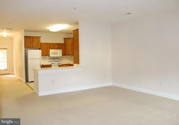a view of a kitchen with a sink