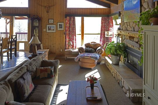 54100 North Ridge Drive Idyllwild, CA 92549 - Photo 2 of 16 Living room looking out to the south