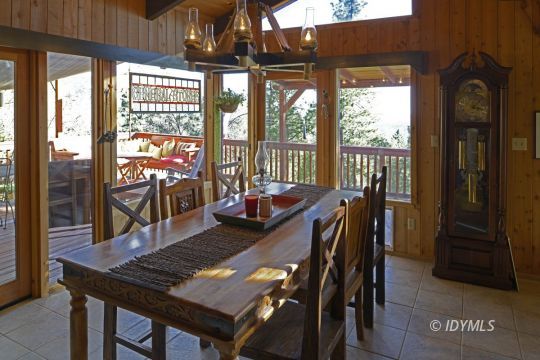 54100 North Ridge Drive Idyllwild, CA 92549 - Photo 4 of 16 Dining area with wrap-around deck